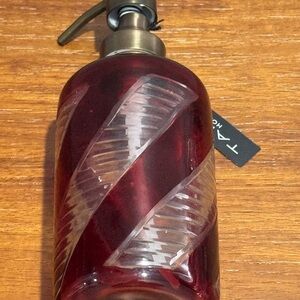 Tahari Home Red Glass Soap Dispenser with Bronze Pump.